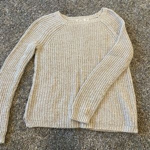 cream colored long sleeve sweater